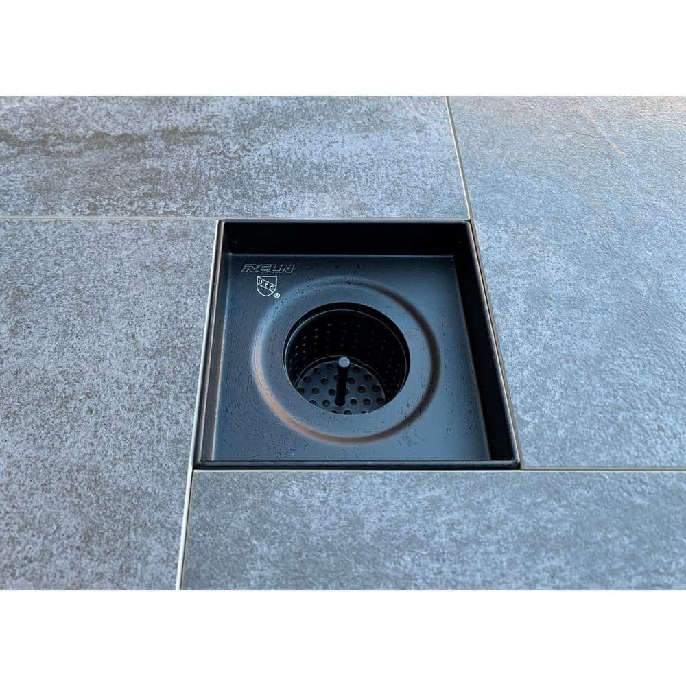 Mixed Metal Brushed Gold and Matte Black Square Shower Drain