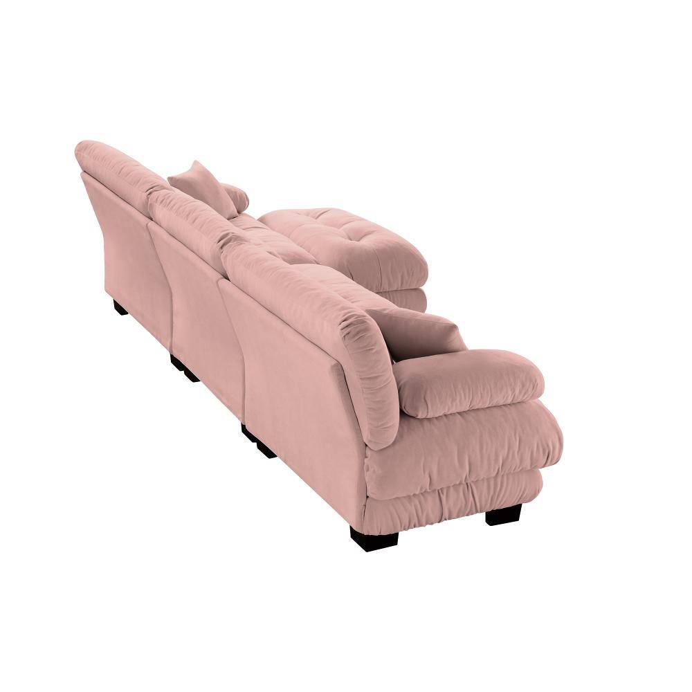 Side view of a pink chenille modular sectional sofa.