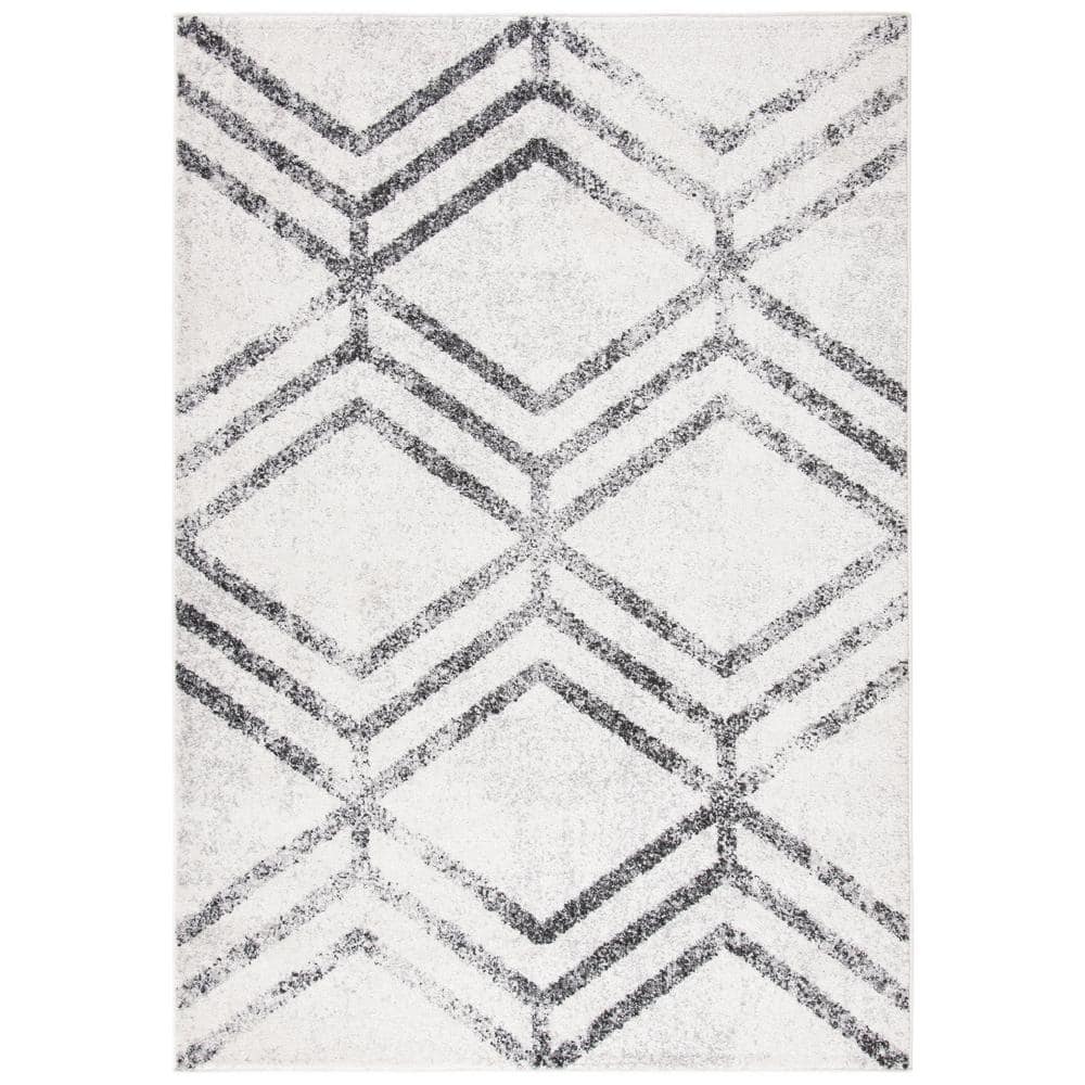 Ivory and Grey Geometric 8' x 10' Synthetic Area Rug