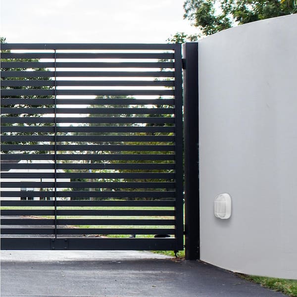 Designers Fountain White 1-Light Outdoor Ceiling Mount Bulkhead Fixture with Ribbed Frosted Glass Shade