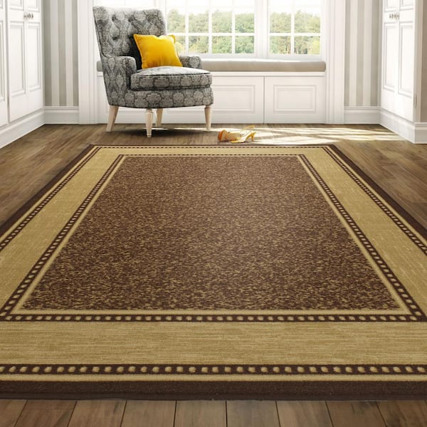 https://images.thdstatic.com/productImages/eaab255d-9552-46d2-b005-231021bdce54/svn/brown-ottomanson-area-rugs-bsc3208-5x7-c3_600.jpg