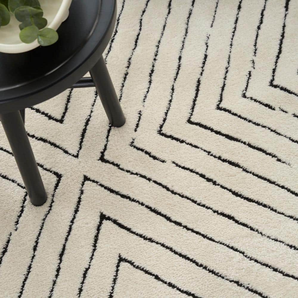 Ivory Black Abstract 8' x 10' Synthetic Area Rug