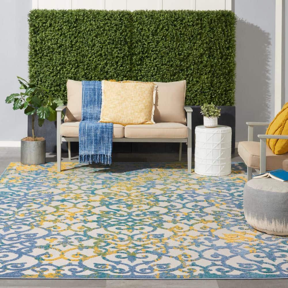 Ivory Blue Floral Synthetic Rectangular Indoor/Outdoor Rug 7' x 10'