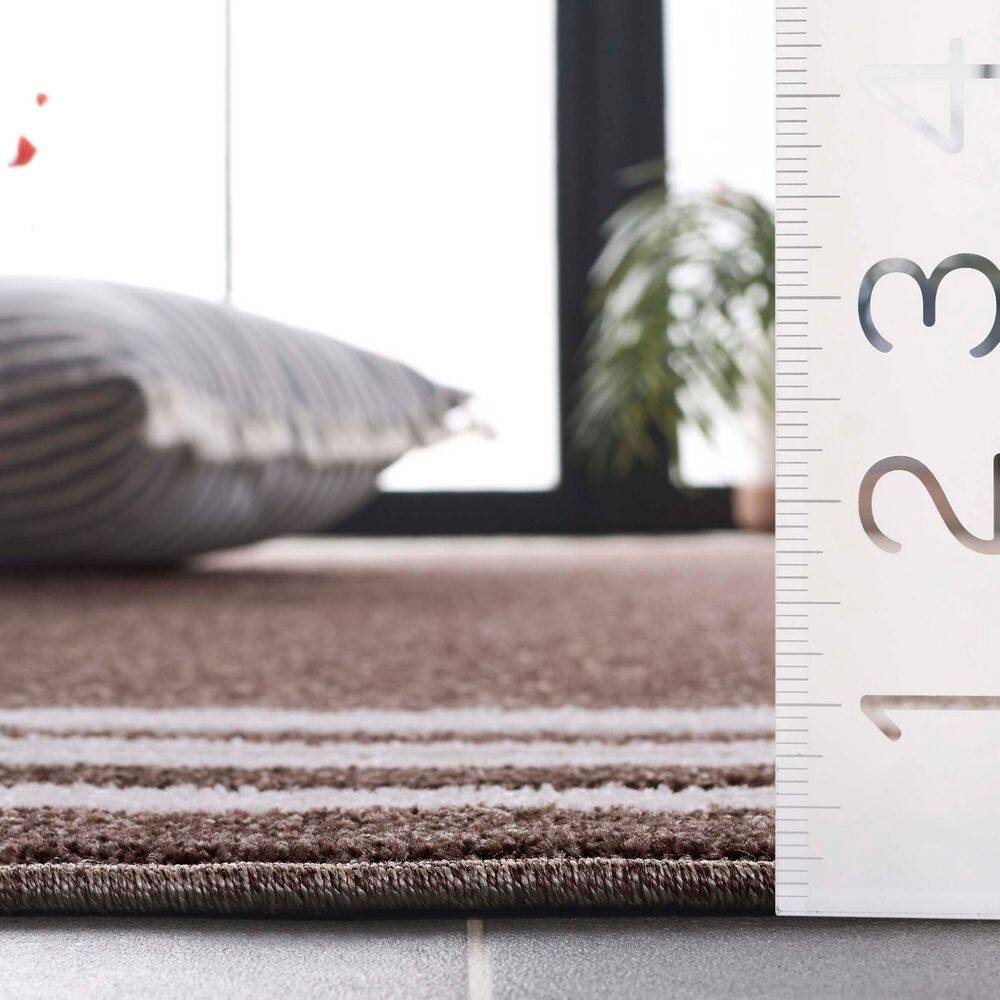 Brown and Ivory Rectangular Synthetic Area Rug, 5'3" x 7'6"