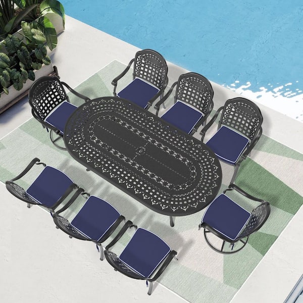 Black 9-Piece Cast Aluminum Oval Outdoor Dining Set with Swivel Chairs and All-Weather Cushions