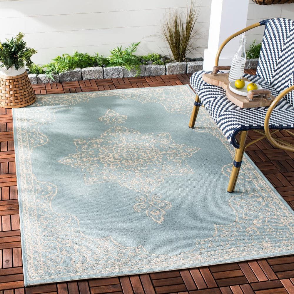 Cream and Aqua Synthetic Rectangular Accent Rug 2'-2" x 4'