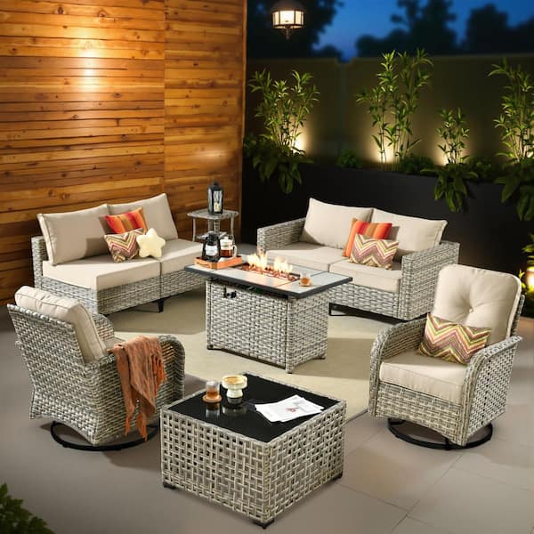 Enchanted 9 Pieces Wicker Outdoor Patio Rectangular Fire Pit Set and Swivel Rocking Chairs with Beige Cushions