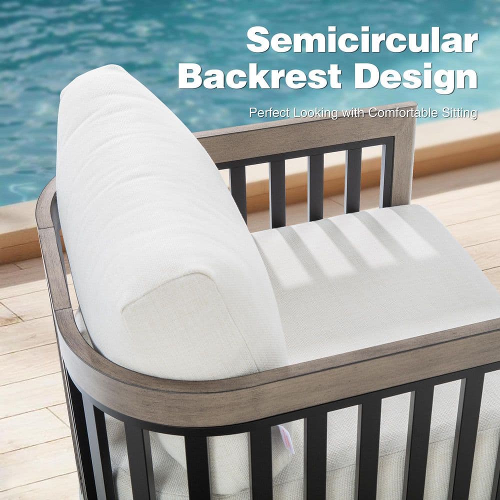 Side view of a curved outdoor armchair with a white cushion and gray frame.