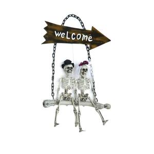 28 in. Skeleton Bride And Groom On A Bone Welcome Swing, Pointing The Way