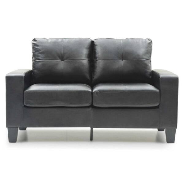 Front view of a black faux leather straight sofa.