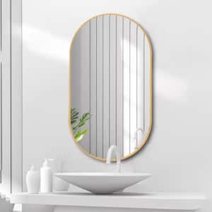 36 in. W x 18 in. H Oval Steel Framed Wall Mounted Bathroom Vanity Mirror in Gold