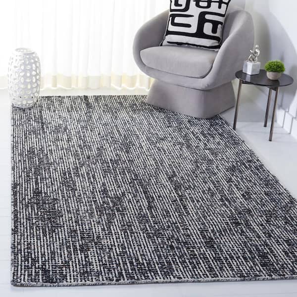 Abstract Black/Gray 6 ft. x 9 ft. Speckled Area Rug