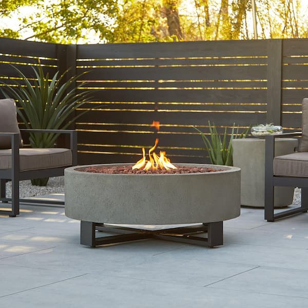 Real Flame Idledale 40 in. W x 16 in. H Outdoor MGO Round Propane Fire Pit in Gray with Lava Rocks and Protective Cover