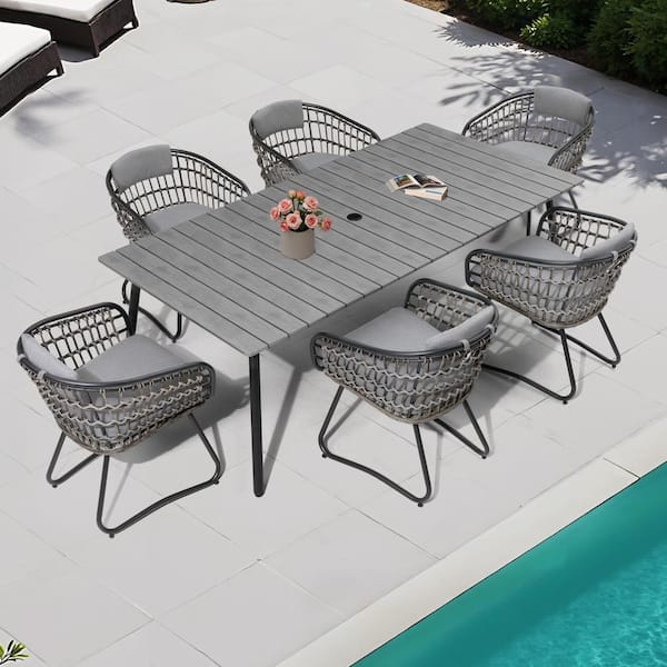 Pellebant 7 of Piece Aluminum Rectangle Table Wicker Chairs Outdoor Dining Set with Gray Cushion