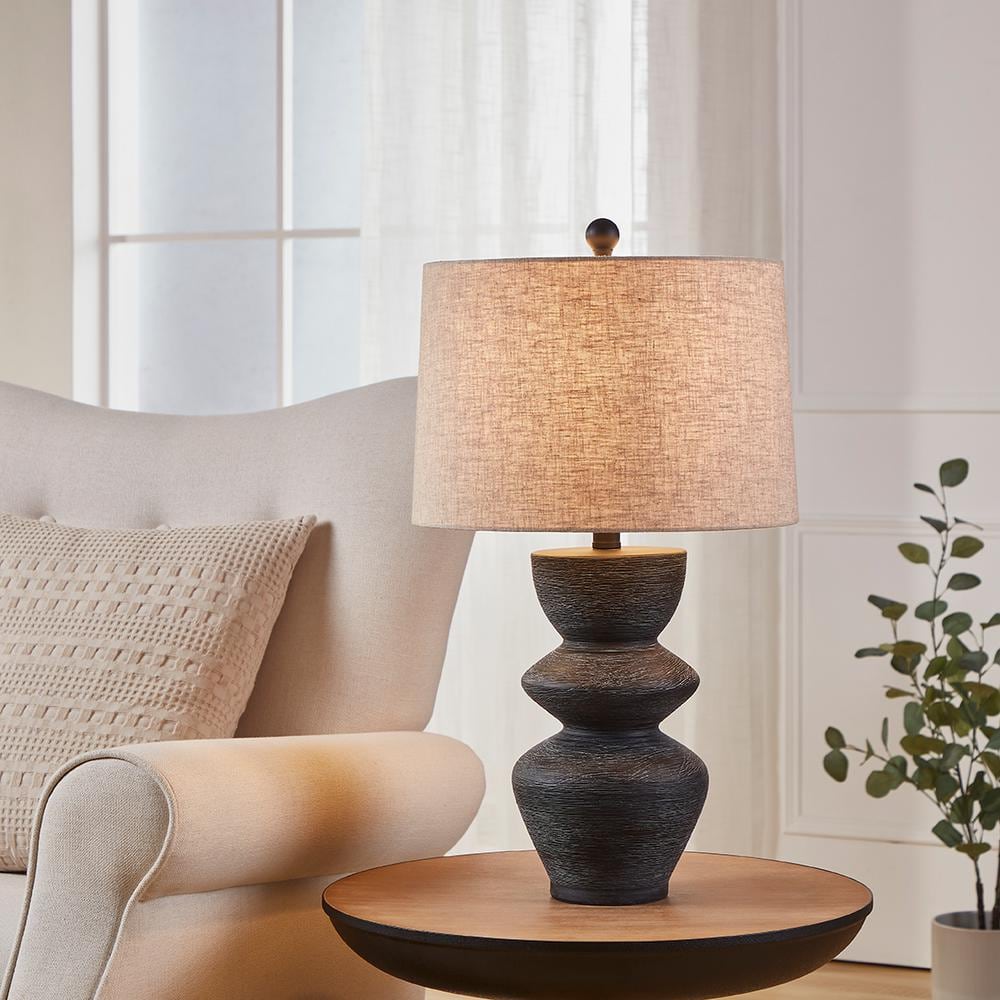 Kawoti 25" Black Distressed Ceramic Table Lamp with Beige Shade