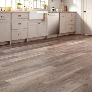 Brushed Oak Taupe 4 MIL x 6 in. W x 36 in. L Grip Strip Water Resistant Luxury Vinyl Plank Flooring (24 sqft/case)