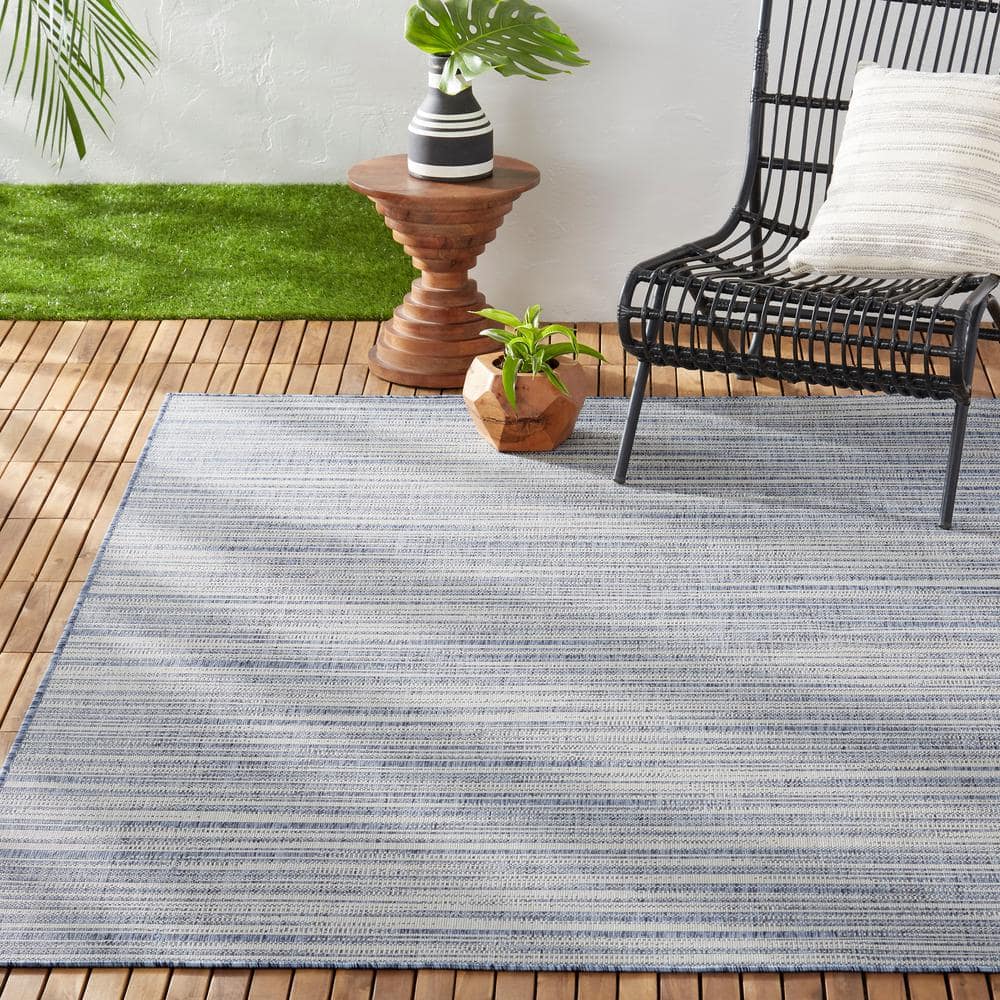 Abstract Blue and Beige Indoor/Outdoor Synthetic Area Rug, 5'2"x7'2"