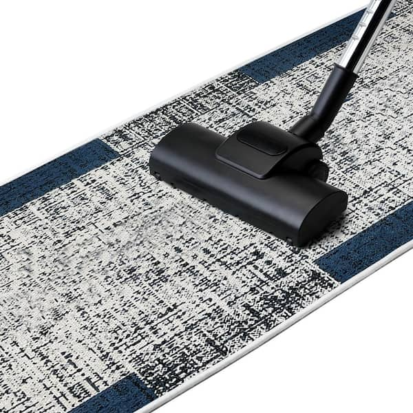 https://images.thdstatic.com/productImages/ebcf0b93-82f5-4178-a3ae-301353223e6c/svn/navy-sussexhome-area-rugs-lnr-10a-2x5-fa_600.jpg