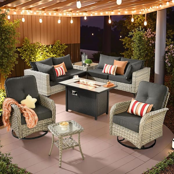 XIZZI Vintage 9 Pieces Wicker Outdoor Patio Rectangular Fire Pit Set and Swivel Rocking Chairs with Black Cushions
