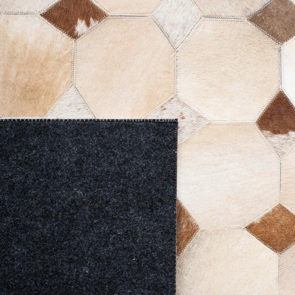 Hand-Stitched Ivory and Brown Geometric Cowhide Rug - 2'3" x 9'