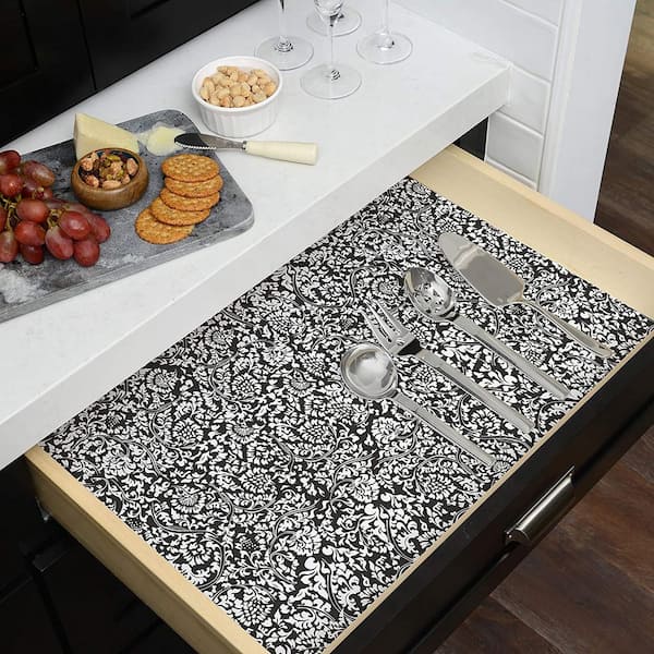 https://images.thdstatic.com/productImages/ebecfba6-31a1-41c4-bf32-562895f8c382/svn/mirabella-black-white-con-tact-shelf-liners-drawer-liners-20f-c9am42-06-1f_600.jpg