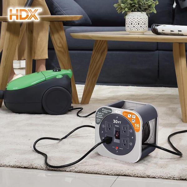 HDX 30 ft. 16/3 Extension Cord Reel with 4 Grounded Outlets and Surge  Protector in Gray EM-EL-300N-HDX - The Home Depot