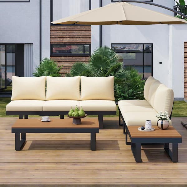 4-Piece Black Metal Patio Conversation Set with Beige Cushions and 1-Coffee Table