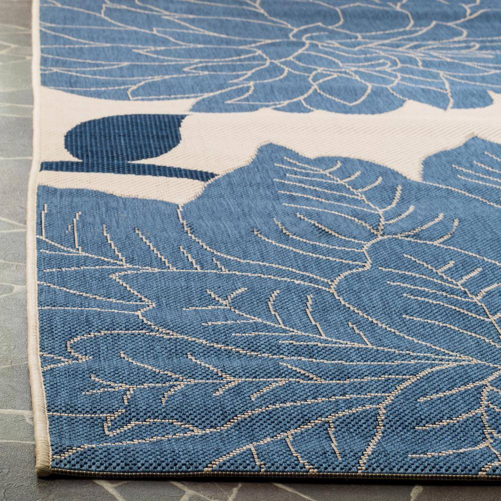 Beige and Blue Floral Synthetic 5' x 7' Area Rug
