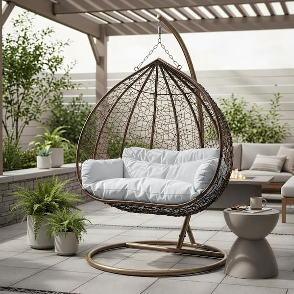Hanging Metal Porch Swing Chair in Brown Stainless Steel Frame with Cushions Recluse Collection in White