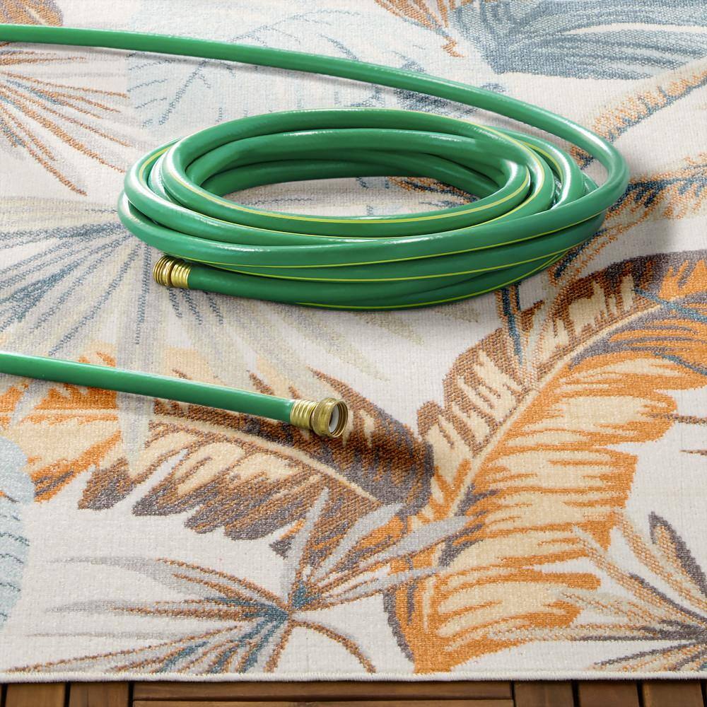 Ivory and Multicolor Tropical Foliage Synthetic Area Rug 5' x 7'