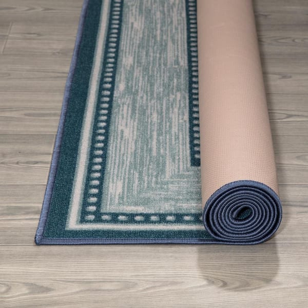 https://images.thdstatic.com/productImages/ec3f9f18-942f-490a-84dc-c93039e69a11/svn/2206-teal-blue-ottomanson-area-rugs-oth2206-5x7-c3_600.jpg