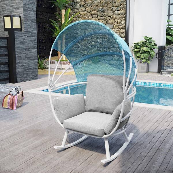 white aluminum rocking chair