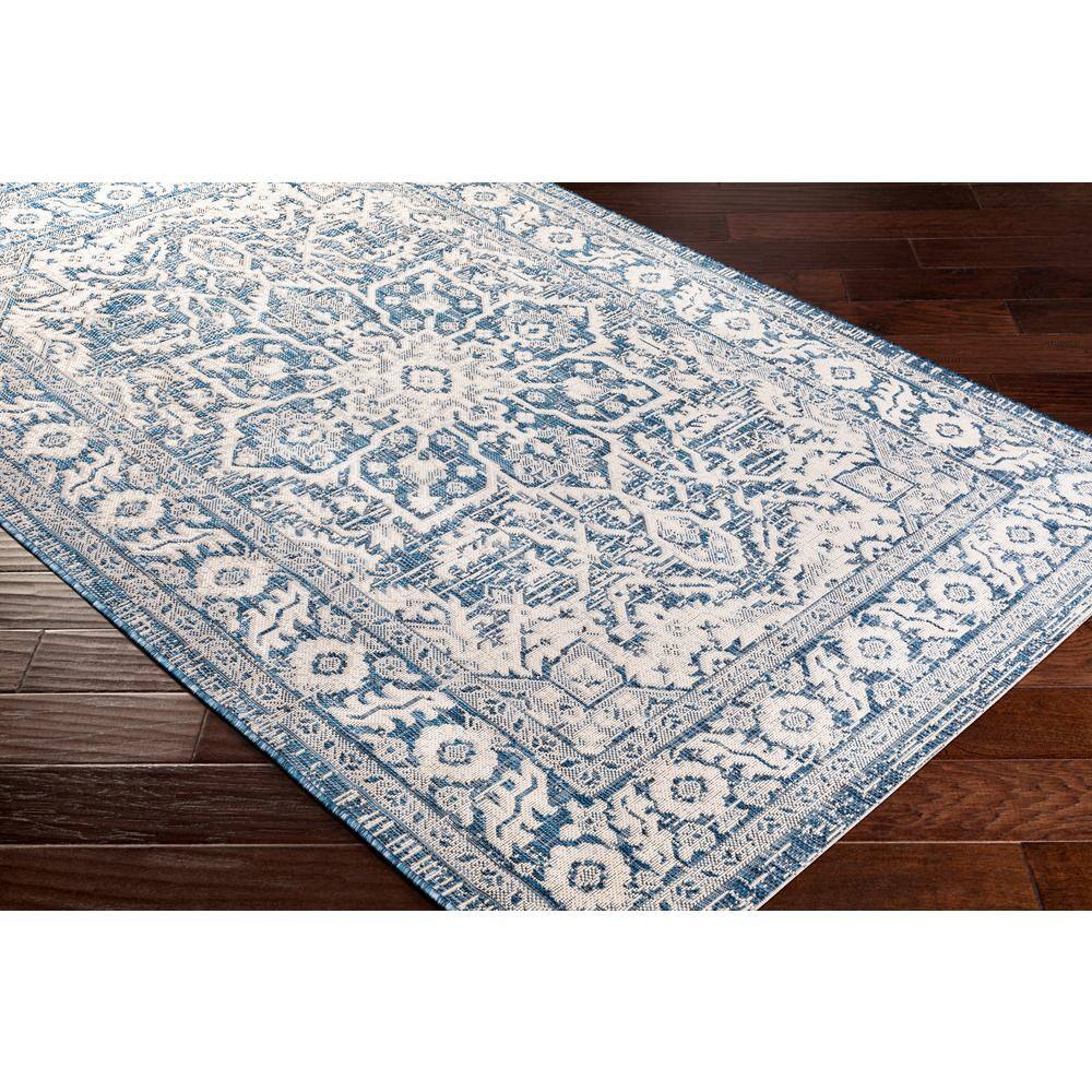 Easy-Care Denim Blue 6'7" Synthetic Round Outdoor Rug