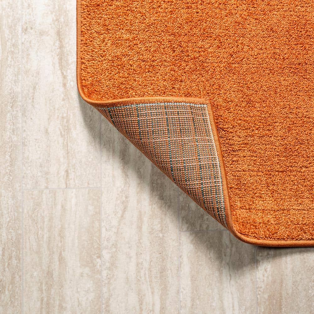 Haze Solid Orange 5'3" Square Synthetic Area Rug