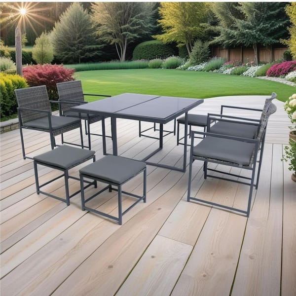 Unbranded 9-Piece Gray Metal Outdoor Dining Set with Gray Cushions and Glass Tabletop and Armrest