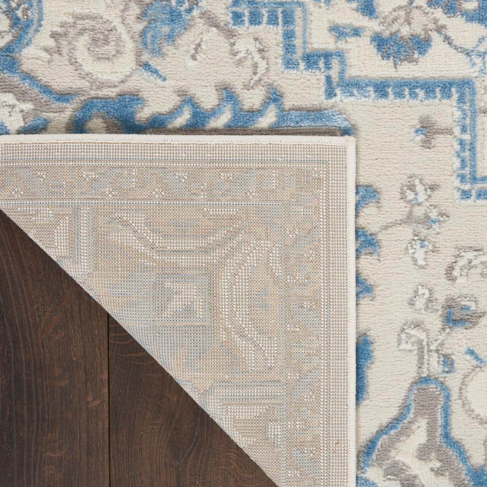 Ivory Blue Floral Synthetic 5' x 7' Rectangular Rug