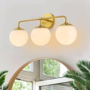 Ceder 23.6 in. W 3-Light Aged Brass Bathroom Vanity Light Floral Polished White Glass Wall Sconce Above Mirror