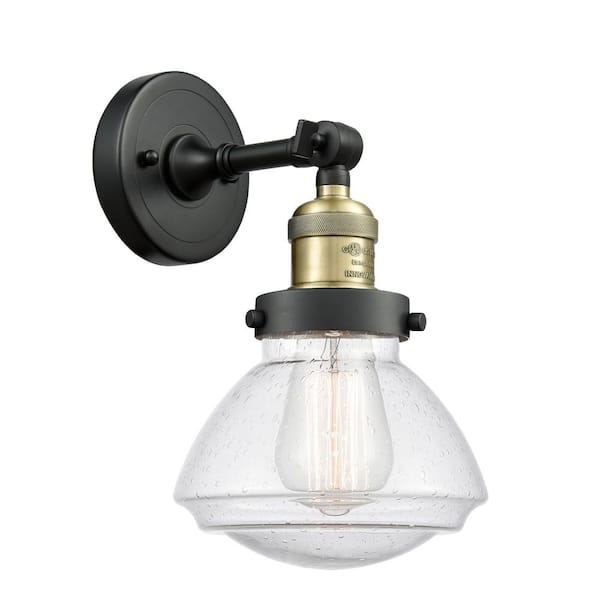 Innovations Olean 1-Light Black Antique Brass, Seedy Wall Sconce with Clear Glass Shade