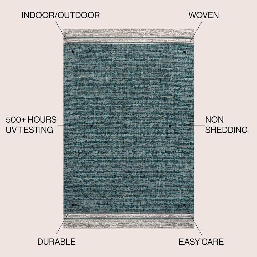 Turquoise and Cream 4' x 6' Solid Synthetic Area Rug