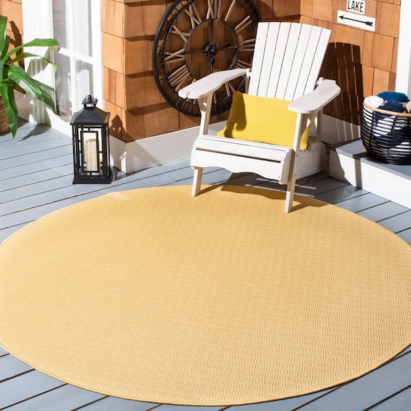 Courtyard Gold/Gold 7 ft. x 7 ft. Solid Color Ikat Indoor/Outdoor Round Area Rug