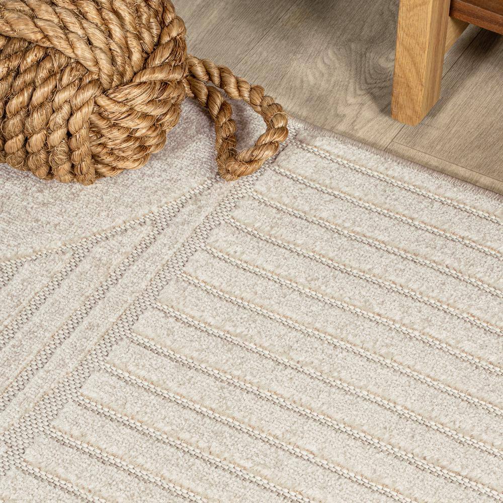 Ivory and Cream Geometric High-Low 8' x 10' Area Rug