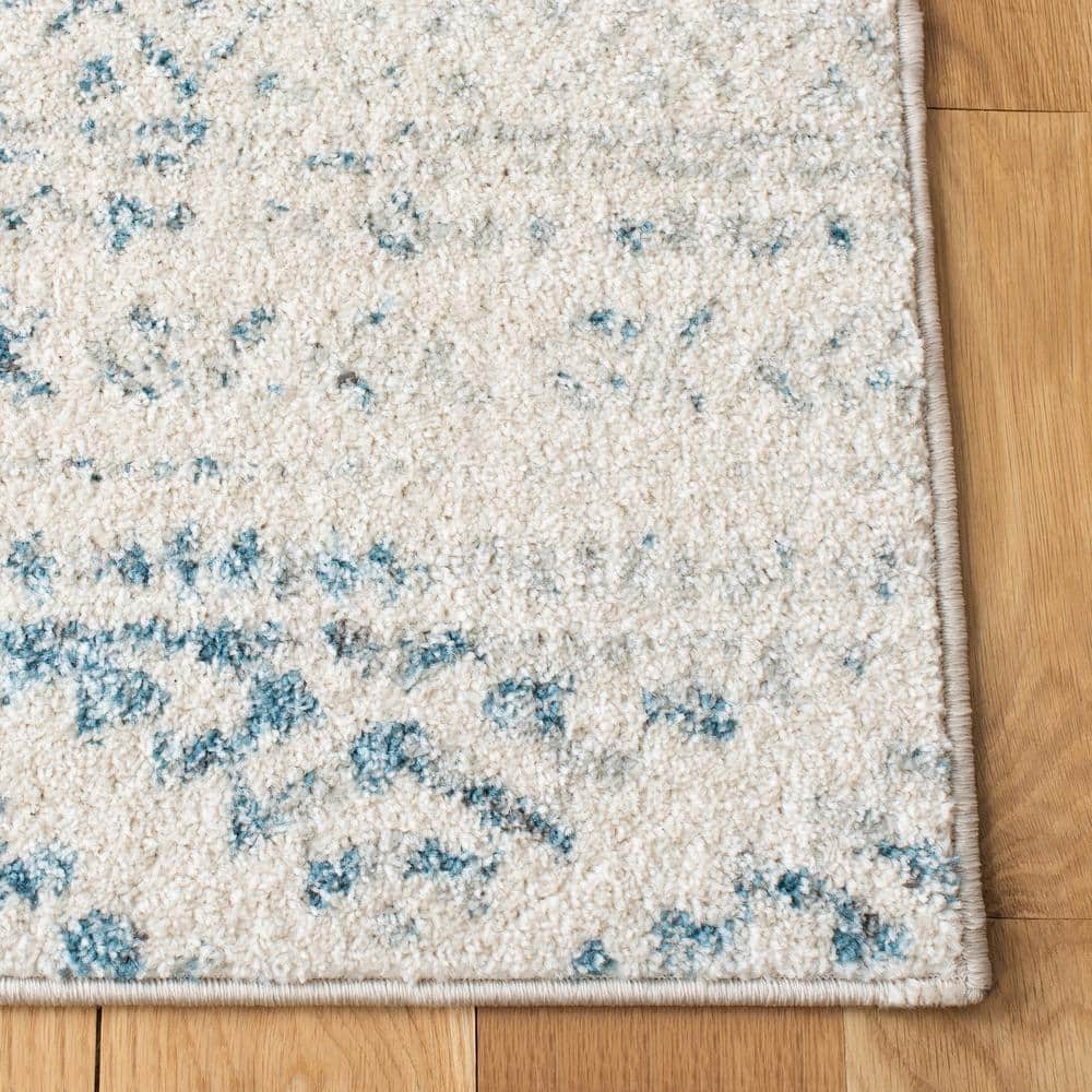 Ivory and Turquoise Geometric Hand-knotted Synthetic Area Rug