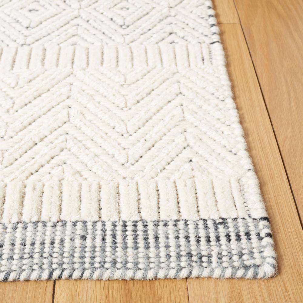 Ivory Tufted Rectangular Wool Area Rug, 5 ft. x 8 ft.