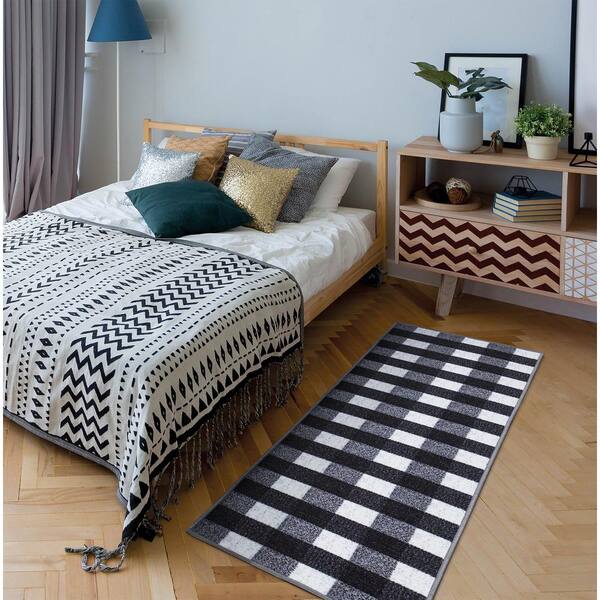 https://images.thdstatic.com/productImages/ecd6e7ad-416e-485d-9571-a161ab5eee4d/svn/black-ottomanson-area-rugs-bsc2013-20x59-e1_600.jpg