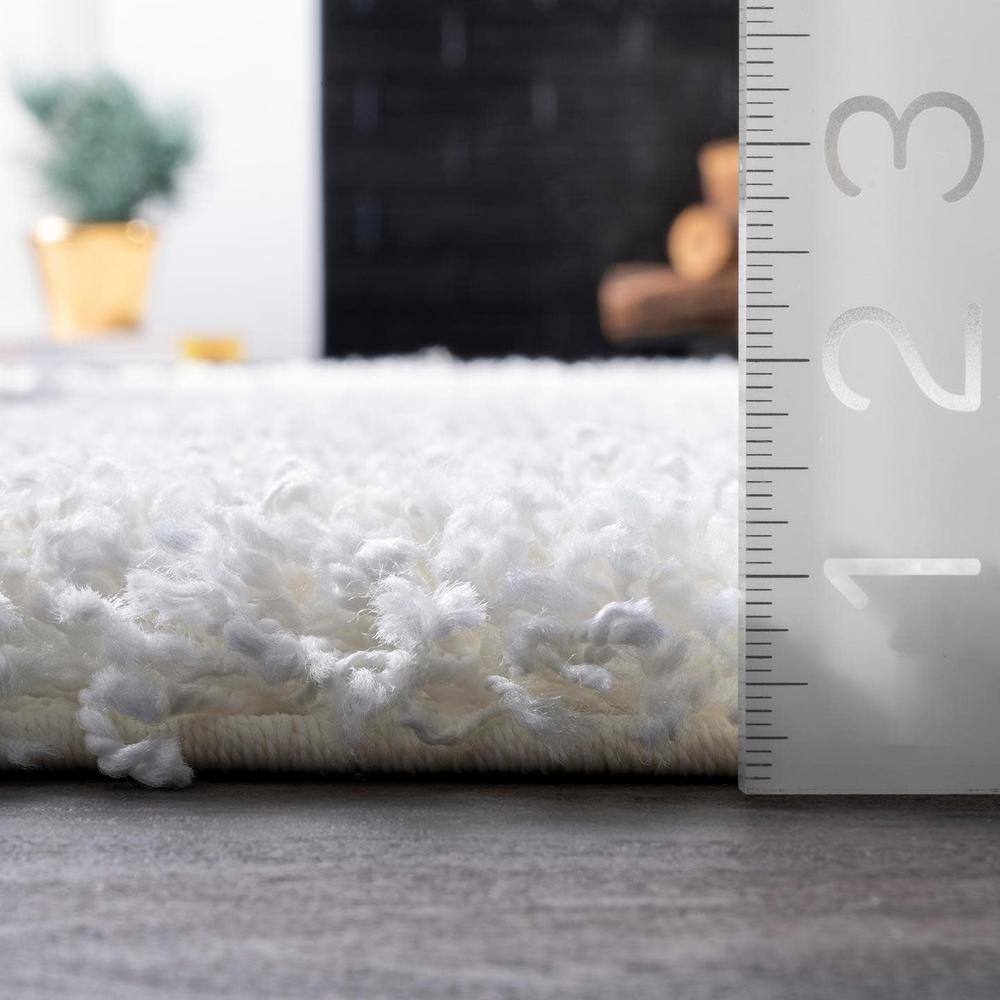 Cozy White Synthetic 8' x 10' Handmade Tufted Shag Rug