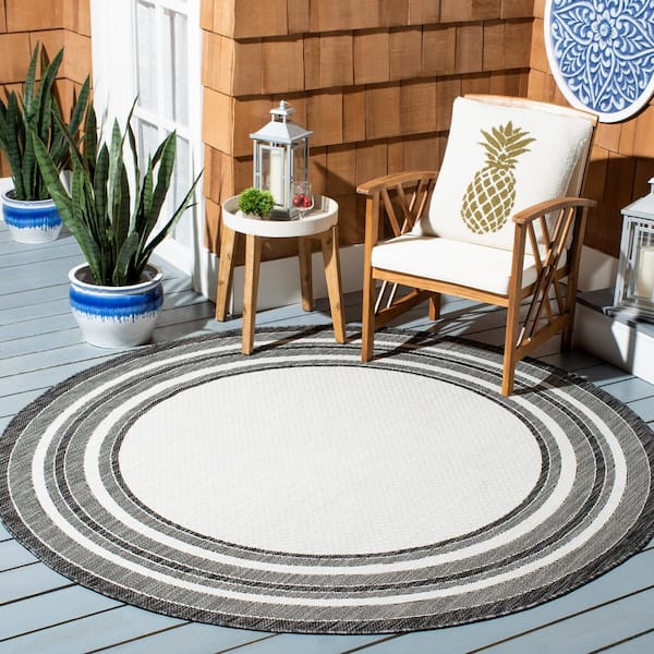 Courtyard Ivory/Black 5 ft. x 5 ft. Solid Color Striped Indoor/Outdoor Round Area Rug