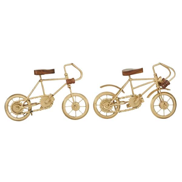 Litton Lane Gold Metal Bike Sculpture with Wood Accents (Set of 2)