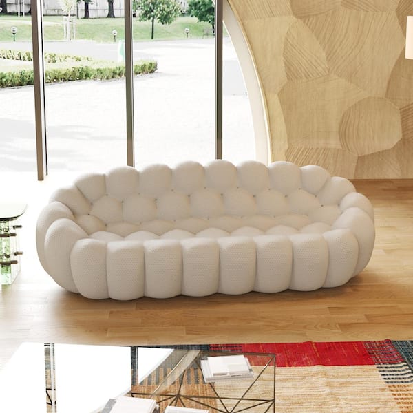 J&E Home 98.4 in W Flared Arm 3D knitted Fabric Curved Reclining Sofa in. Beige