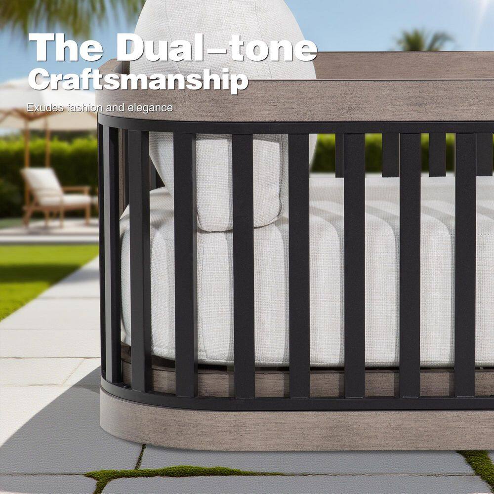 Close-up of the dual-tone gray and black aluminum frame of an outdoor chair.