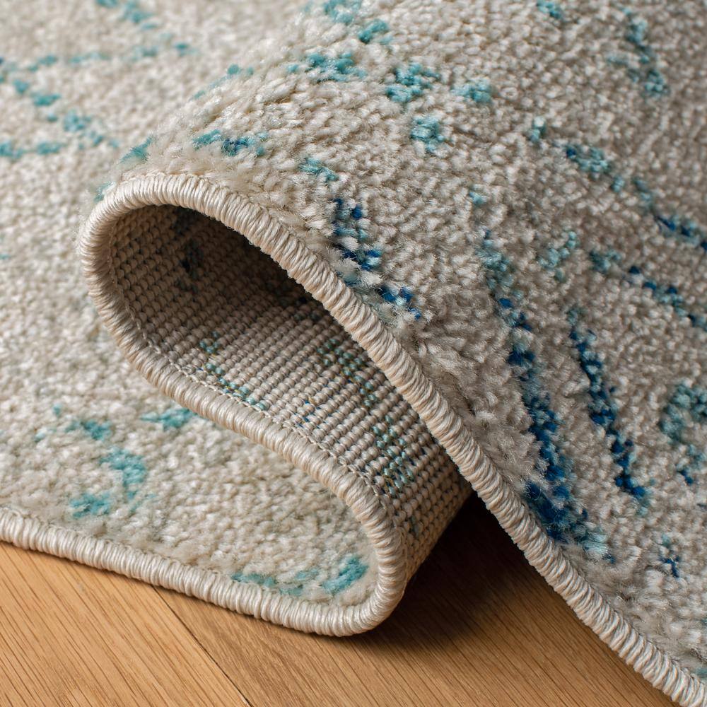Ivory and Aqua Hand-Knotted Synthetic Area Rug
